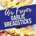 breadstick dipped in sauce and pile of air fryer breadsticks next to air fryer