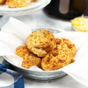 A white bowl of air fryer lobster biscuits.