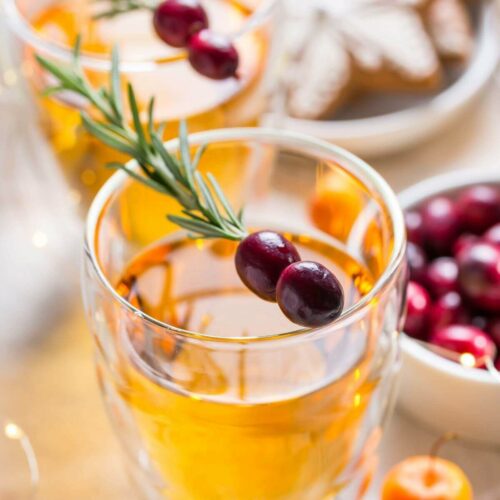 Apple Boilo with a sprig of cranberries.