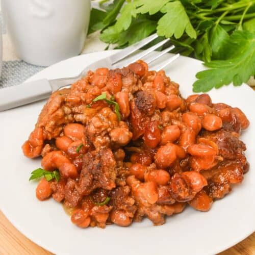 A white plate with the finished side dish o it.