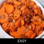 A white dish filled with sliced brown sugar carrots and bacon pieces, with a spoon in the background. Text reads: "Easy Brown Sugar Carrots with Bacon.