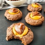 A bite taken out of a buckeye brownie cookie.