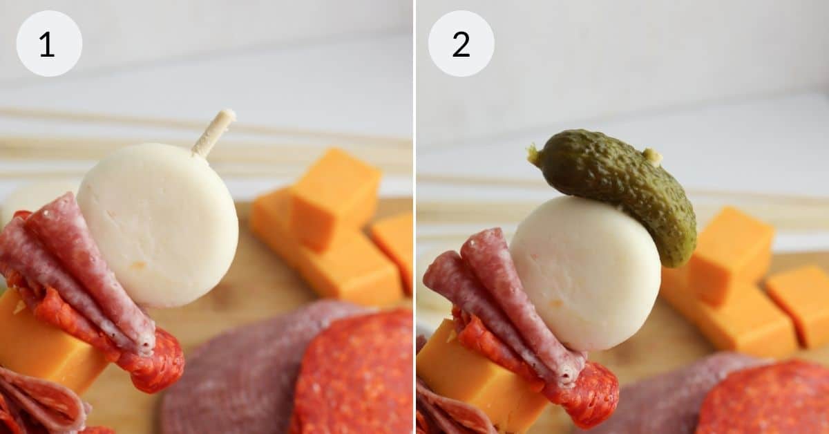 Two images illustrating the layering steps for charcuterie skewers. Image 1: A cheese round with a toothpick inserted. Image 2: A cheese round topped with a pickle, supported by folded sliced meats and cheese cubes.