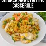 A plate of chicken and stuffing casserole, featuring tender chunks of meat blended perfectly with savory stuffing, is artfully paired with colorful mixed vegetables on a crisp white table.