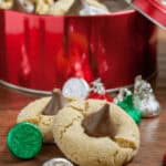 A tin of the finished Hershey Chocolate Kiss Cookies.