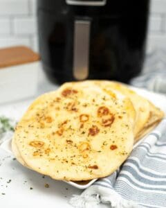 Air fryer with naan bread.