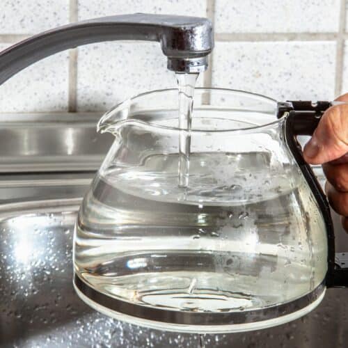 Rinsing your coffee pot.