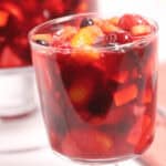 A serving of cranberry jello salad.