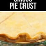 A close-up of a baked pie with a golden, crimped crust in a glass pie dish, labeled “Classic Crisco Pie Crust” at the top, showcasing the flaky perfection of this iconic Crisco Pie Crust recipe.