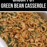 A white baking dish filled with Crock Pot Green Bean Casserole, topped with crispy fried onions.