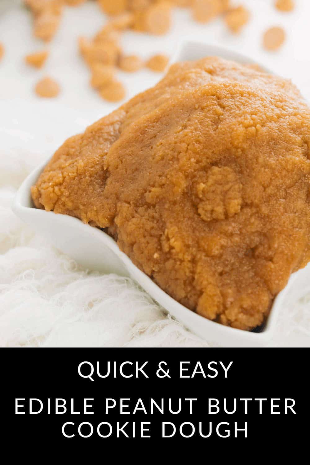 A tempting bowl of edible peanut butter cookie dough sits invitingly, with small morsels enticingly scattered in the background.