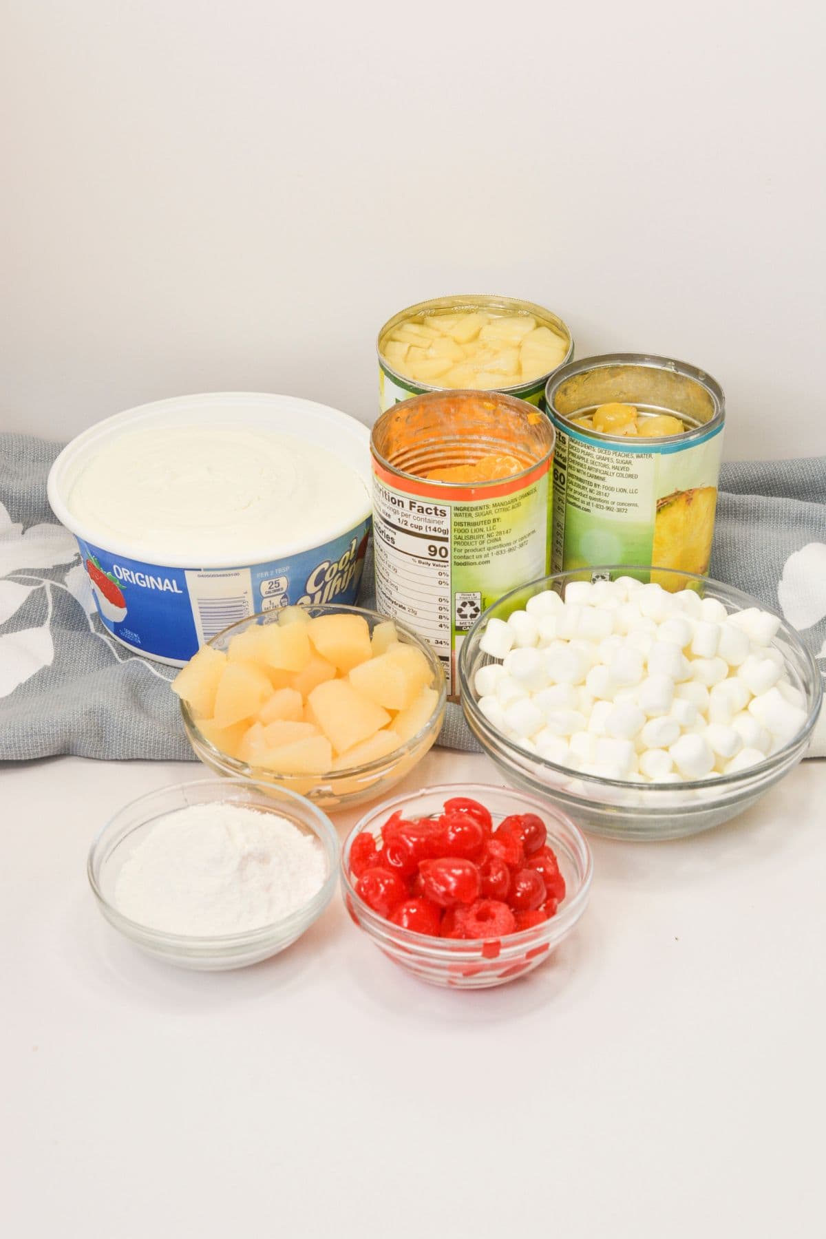 Canned fruit, whip topping and marshmallows fo r the  side.