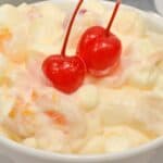 Cherries on top of the ambrosia salad.
