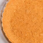 A close-up of a round glass pie dish, ready for your favorite filling.