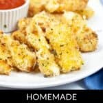 A plate of crispy Air Fryer Mozzarella Sticks served with a small cup of marinara sauce, labeled "Homemade Air Fryer Mozzarella Sticks.