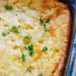 A close-up of the dish topped with chopped parsley in a rectangular baking dish.