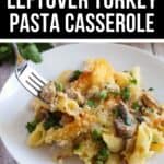 A serving of leftover turkey pasta casserole with peas and cheese on a white plate, being enjoyed with a fork—this easy Turkey Pasta Recipe is perfect for transforming holiday leftovers into a comforting meal.