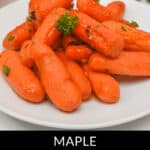 A plate of shiny, maple glazed baby carrots garnished with parsley, accompanied by the text "MAPLE GLAZED CARROTS" below.