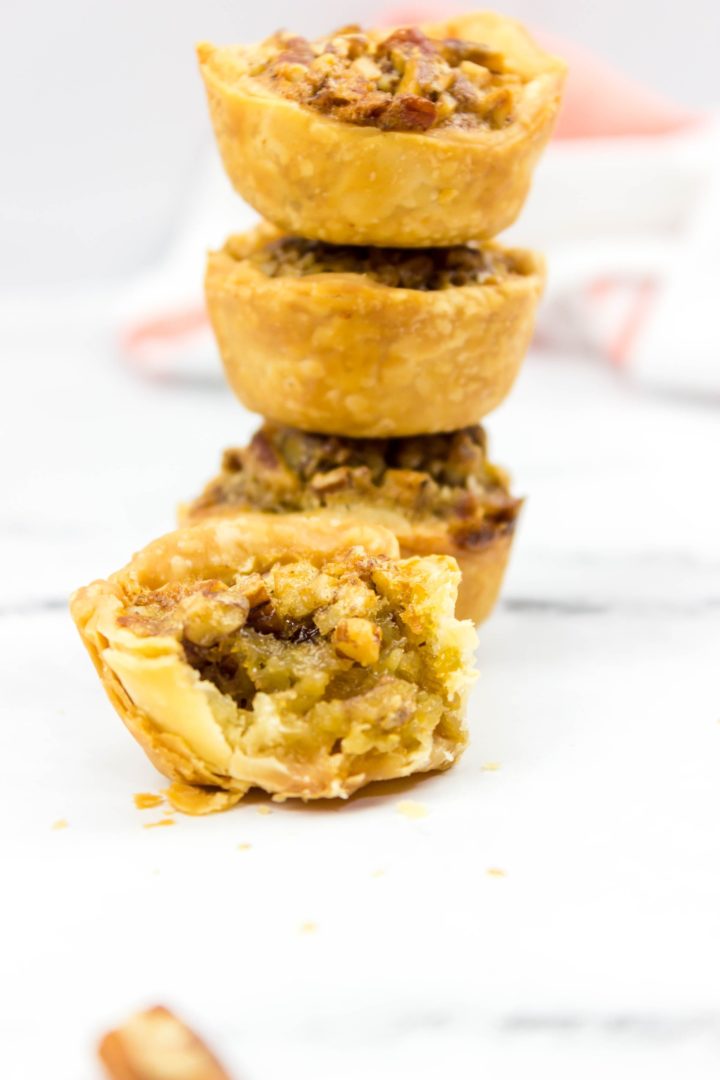 Stack of Mini Pecan Tarts.