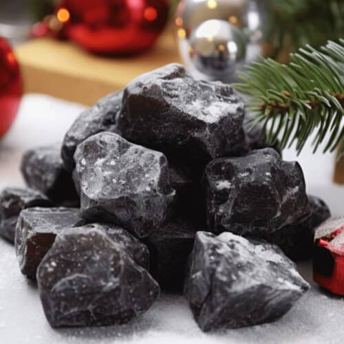 A bunch of santas coal candy.