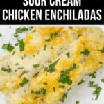 A delectable plate of Sour Cream Chicken Enchiladas, topped with melted cheese and garnished with chopped parsley.