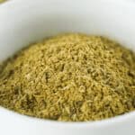 A bowl of the finished substitute for poultry seasoning.