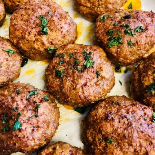 A tray of the finished meatballs.