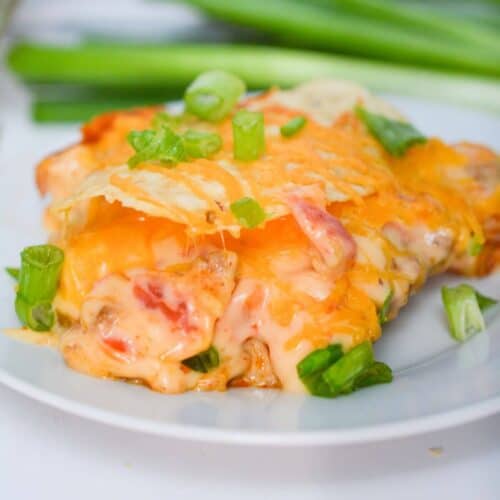 A white plate with a serving of the tex mex casserole with ground beef.