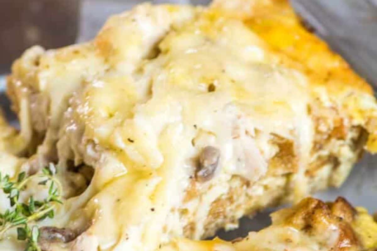A close-up of a slice of Thanksgiving leftover breakfast casserole.
