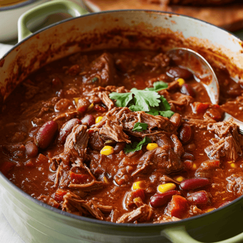 Leftover Brisket chili in an enamel pot.